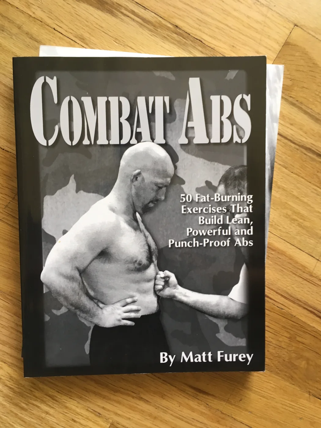 Combat Abs: 50 Fat-Burning Exercises That Build Lean, Powerful and Punch-Proof Abs — Front Cover